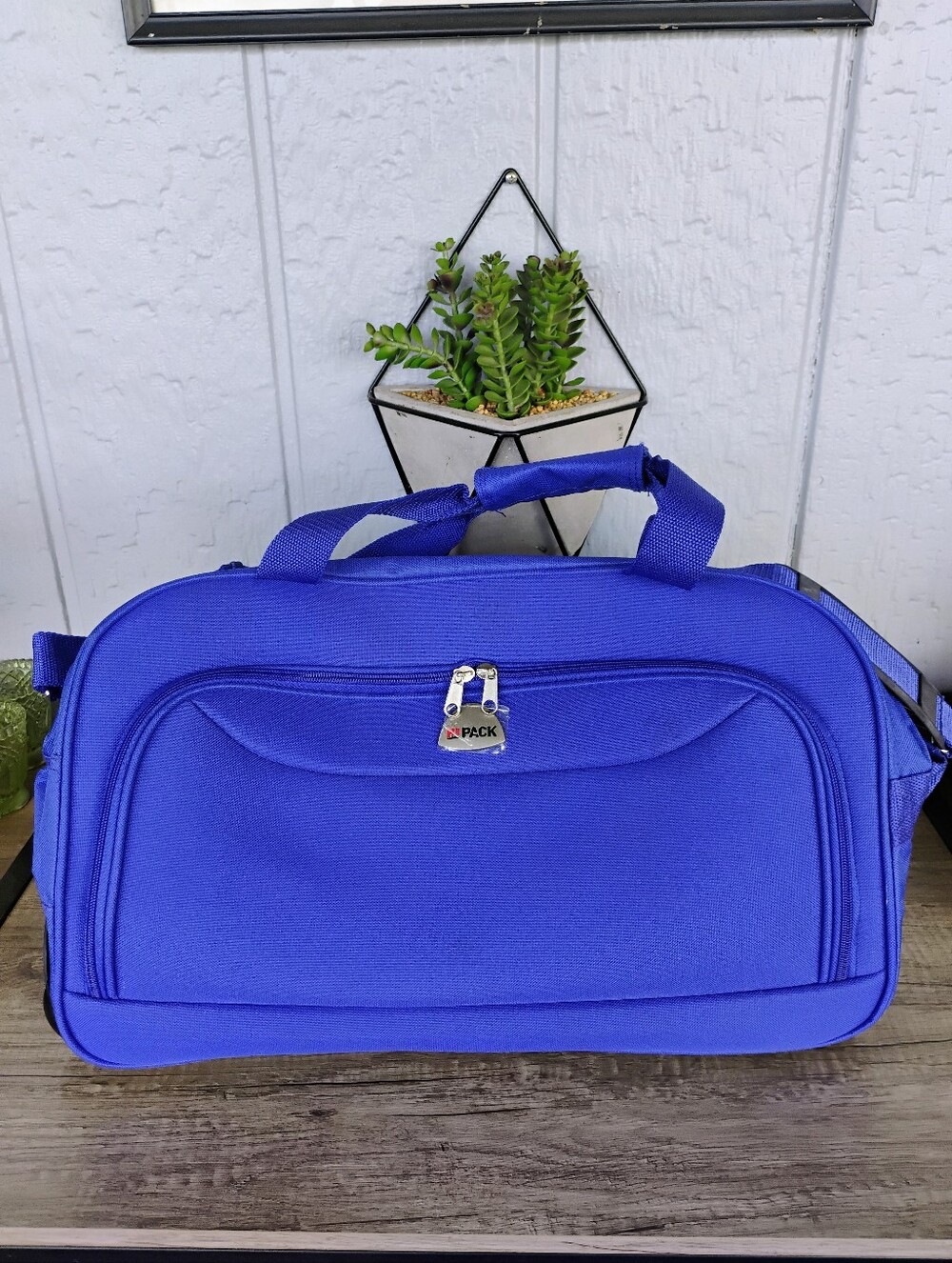Blue rolling Duffel Bag never used